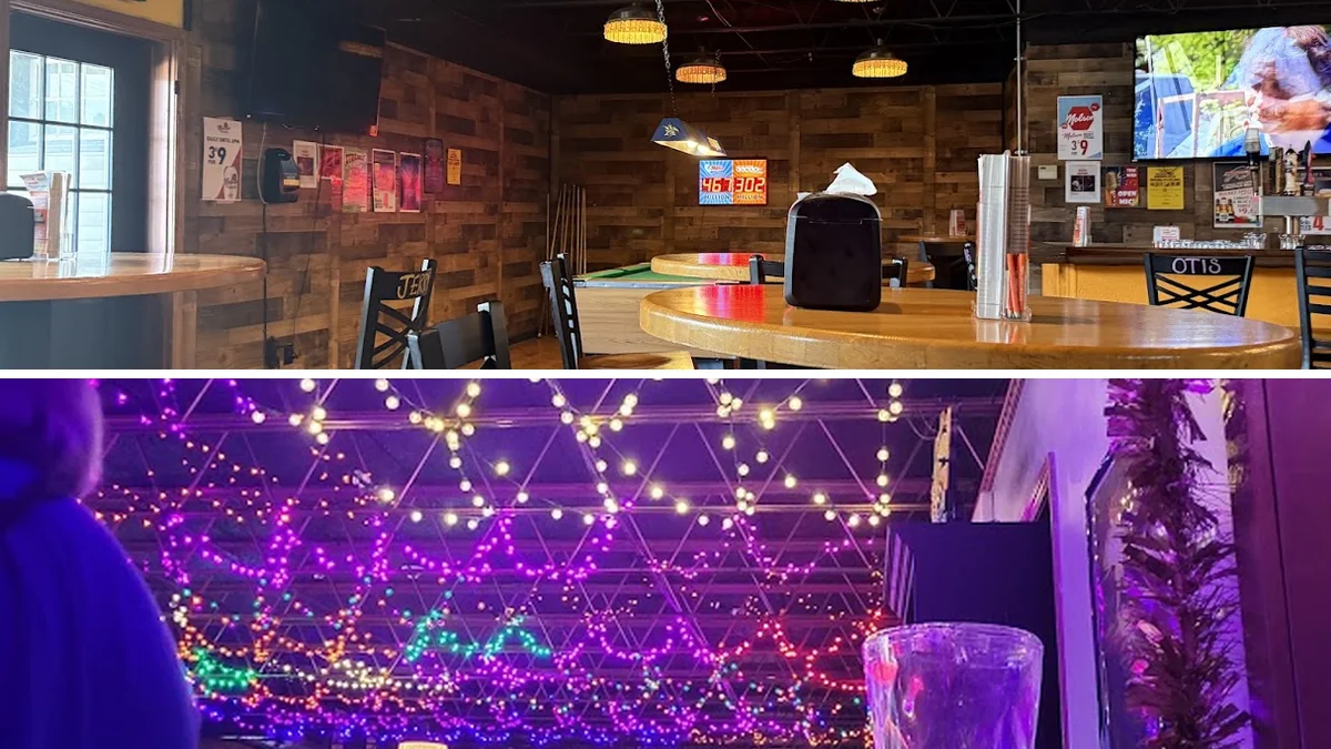 Warm tavern interior with live music stage.